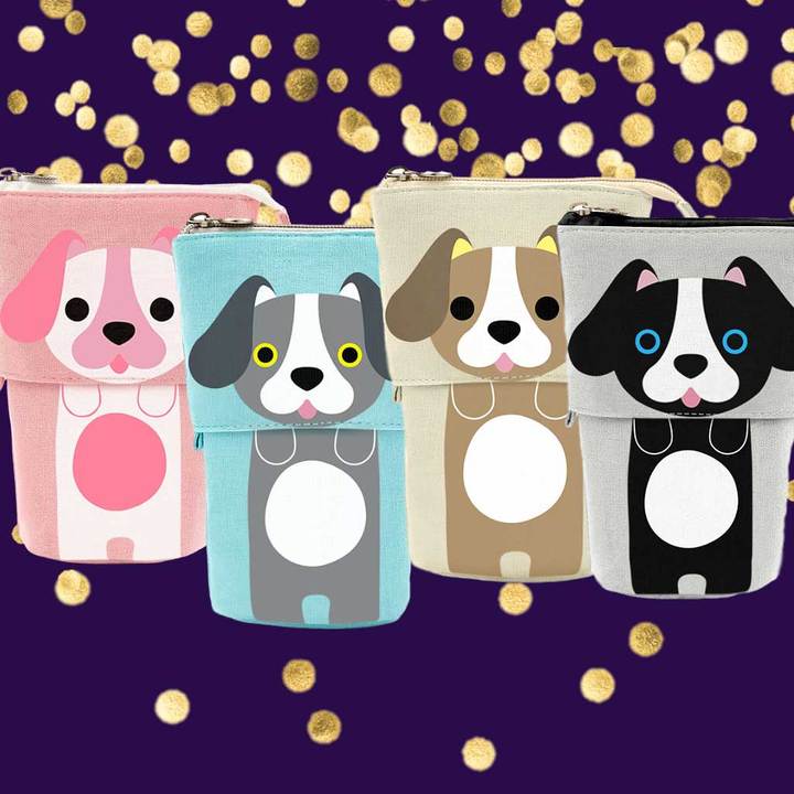 4 different color dog pencil pouches on purple background.